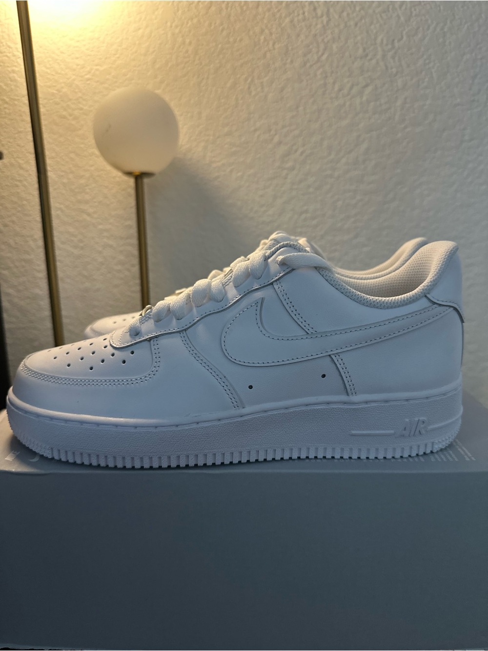 Nike Air Force 1 '07 white sneakers
Size US 8M